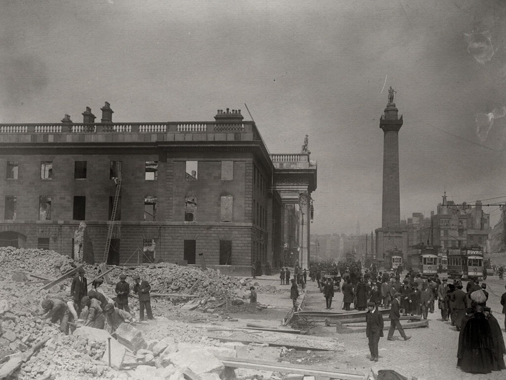 A photo of the aftermath of the Easter Rising, 1916 with Nelson's Pillar in view (right).
