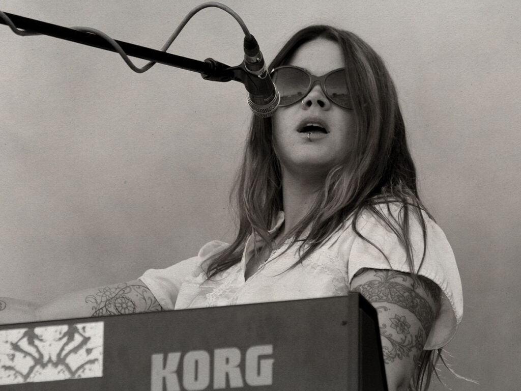 Zia McCabe performing with The Dandy Warhols in 2012.