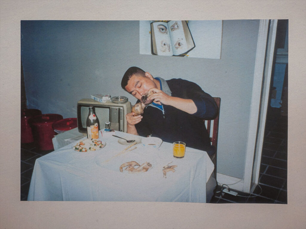 Photo from Zhu Yu - 'Dinner – Eating People' Installation - 2000.