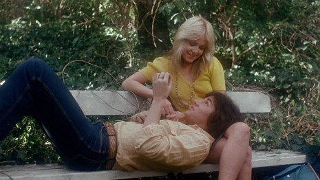 Linnea Quigley and friend getting stoned at the park. 