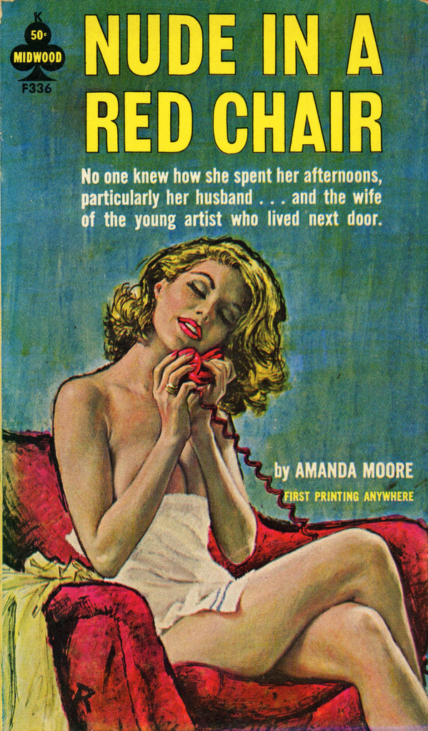 Nude in a red chair
